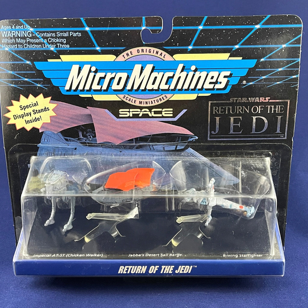Star Wars Micro Machines Return of the Jedi collection.  Imperial AT-ST, Jabba’s Desert Sail Barge, B-Wing starfighter